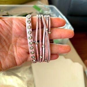Another triple strand bracelet in pink and shiny raspberry